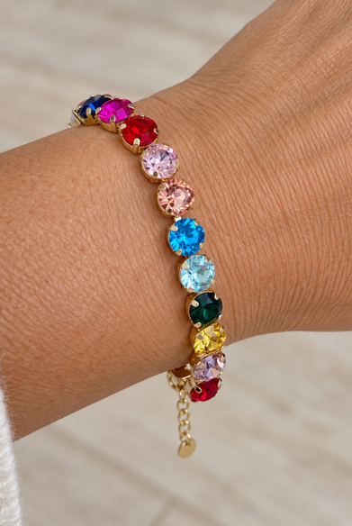 Rainbow Rhinestone Bracelet by Marj & Lizzie, multicolor rhinestones in gold bezels with extender chain, worn on wrist