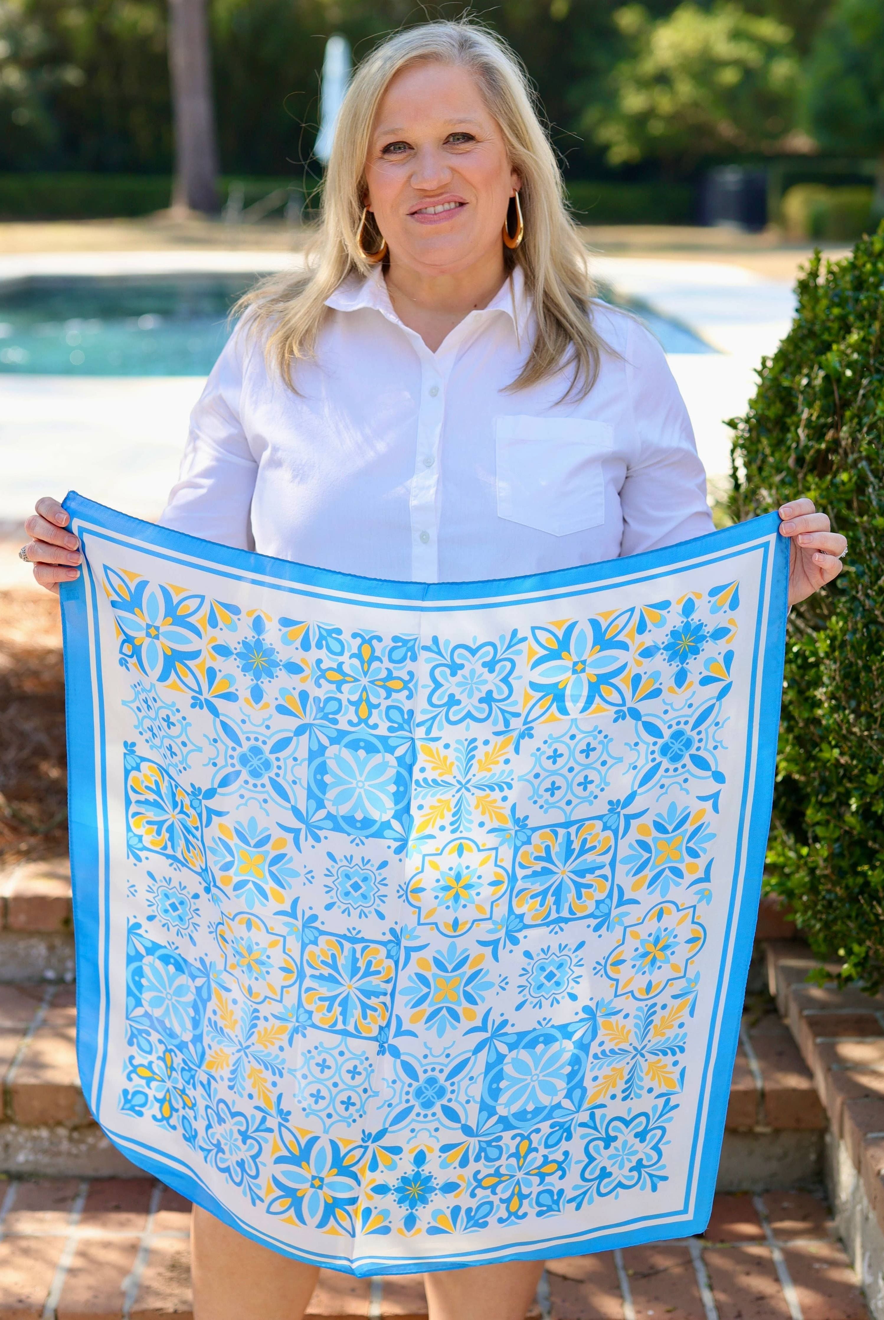 Blue Sorrento Mosaic Print Scarf by Caroline Hill, stylish accessories with intricate mosaic design, shown draped on a model.