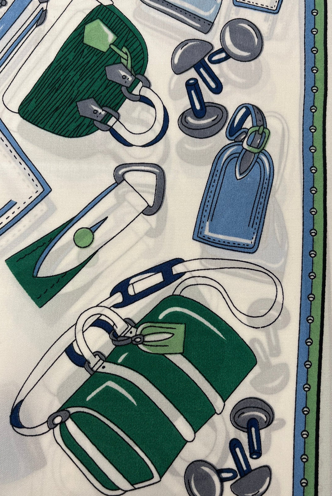 German Fuentes handbag scarf accessory featuring a stylish, colorful design draped over a handbag for a chic look.
