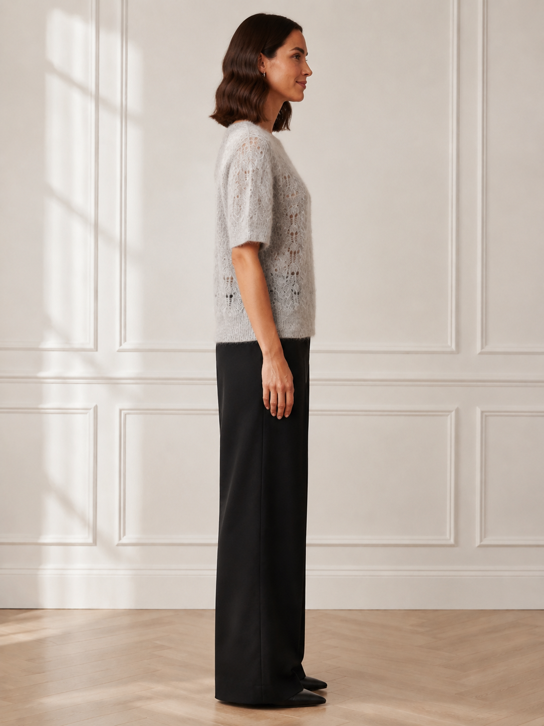 Another Love Amila Top in heather gray, short-sleeve pointelle knit sweater with banded hem, side view