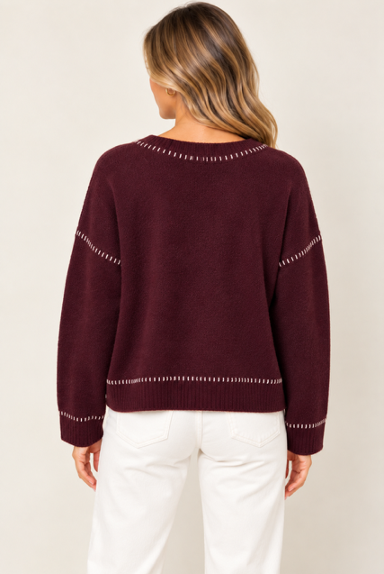 Millie Sweater by Another Love in burgundy with contrast embroidery at neckline, shoulders, cuffs and hem, back view