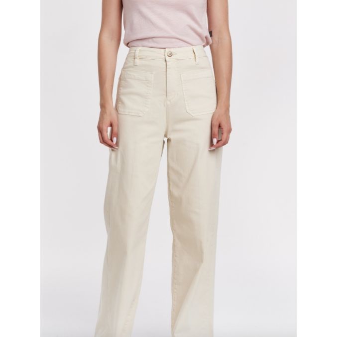 Light-colored high-rise Bristol Pants by Another Love featuring patch pockets and a relaxed fit, styled for casual wear.