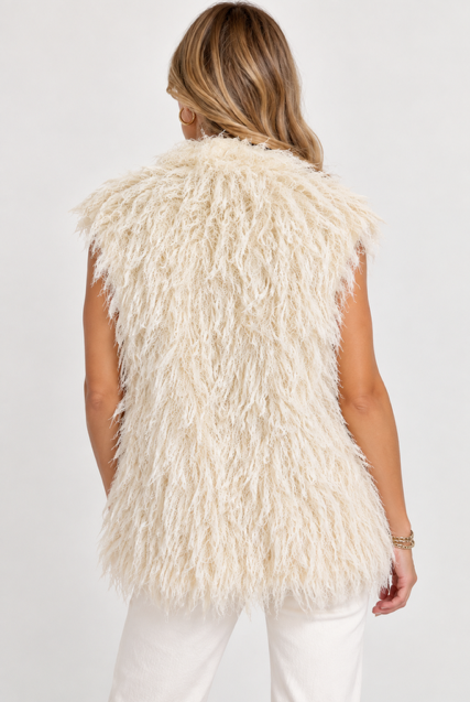 back view: Harlow Vest by Another Love in cream with allover fringe and a sleeveless silhouette, back view on model