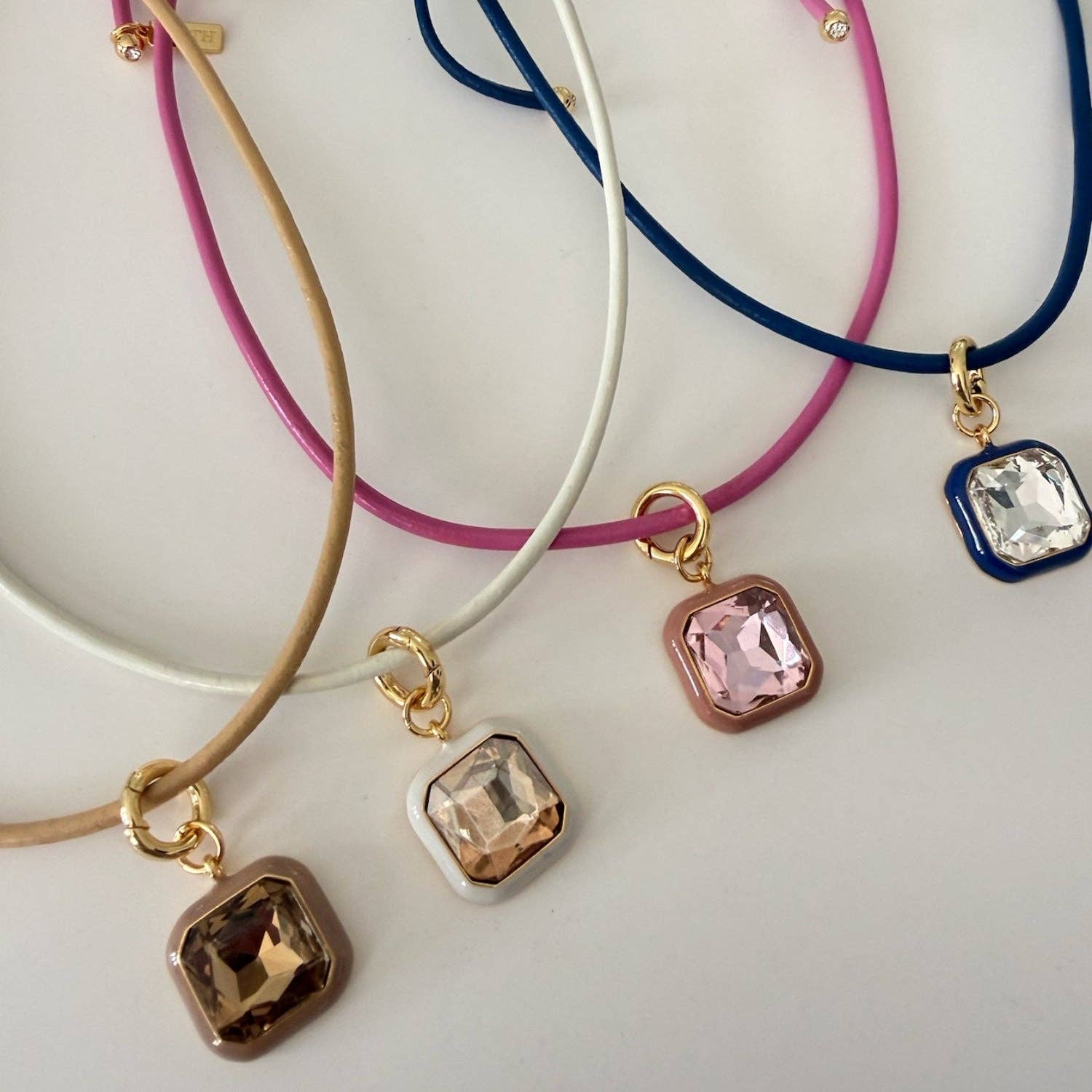 Aurora Pendant Necklace by Smith and Co. Design — square enamel rhinestone pendants in multiple colorways on leather cords