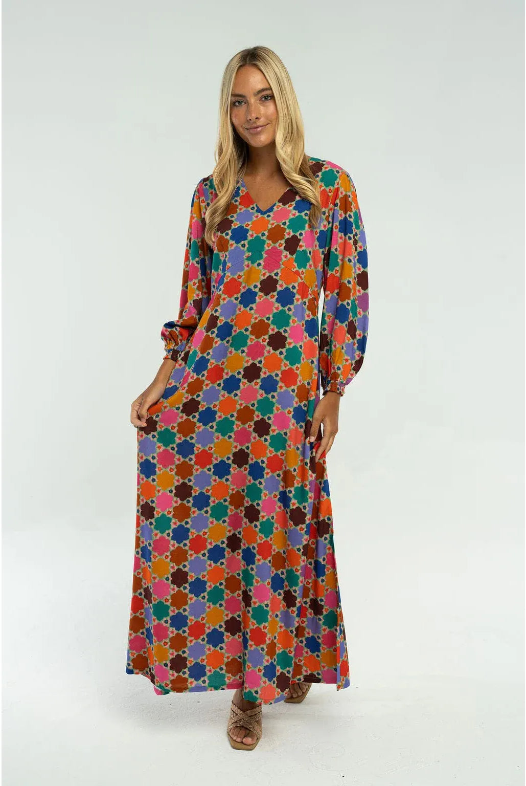 Briton Court Layla Maxi Dress in flowing fabric with a stylish fall design, perfect for elegant occasions.