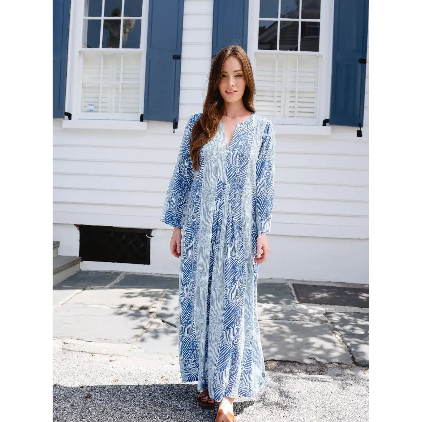 Blue Kali Maxi dress from Briton Court's Nantucket collection, flowing fabric and elegant design perfect for summer occasions.