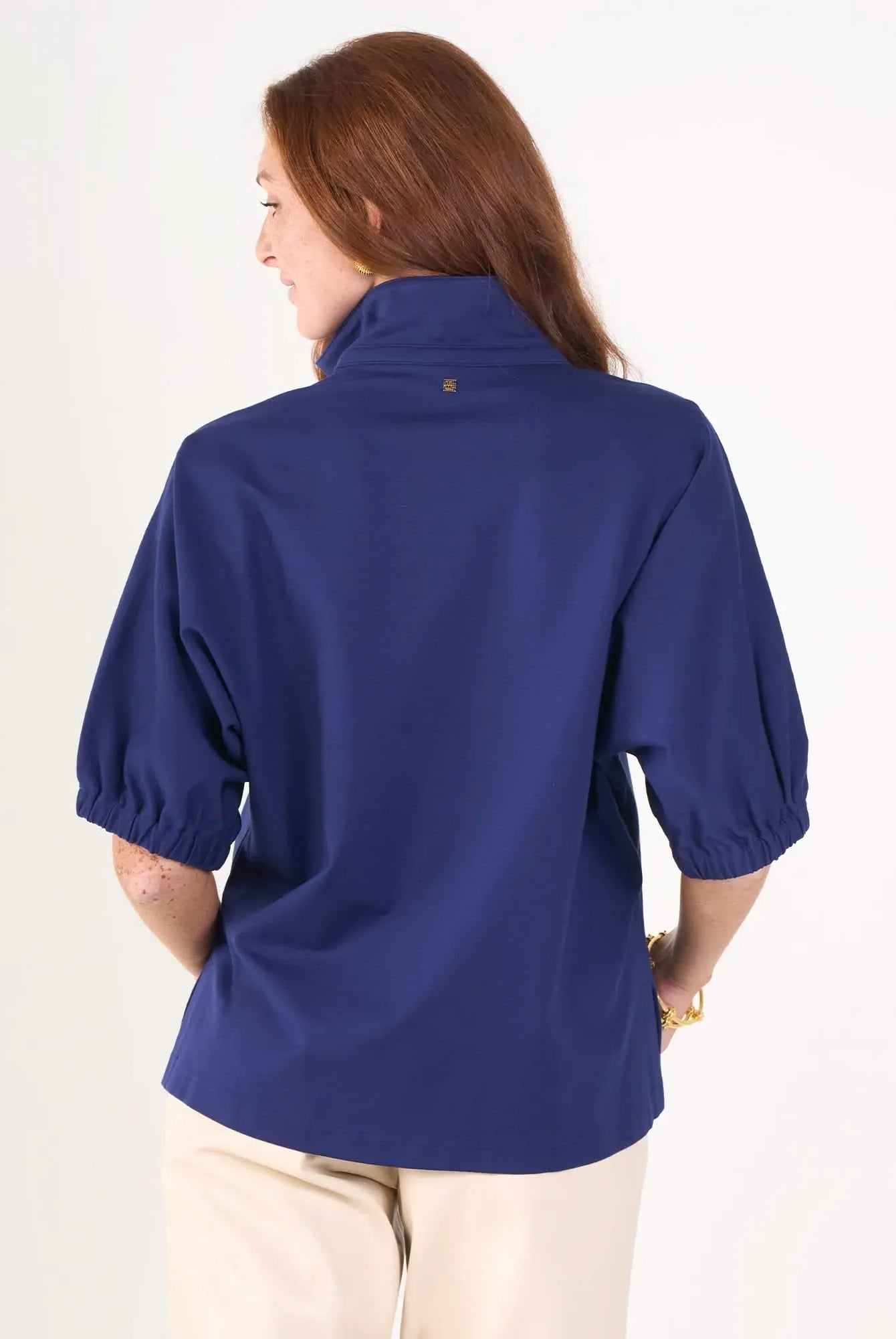 Navy Poppy Top by Emily McCarthy made of cotton poplin, shown from the back with a relaxed fit and classic design.