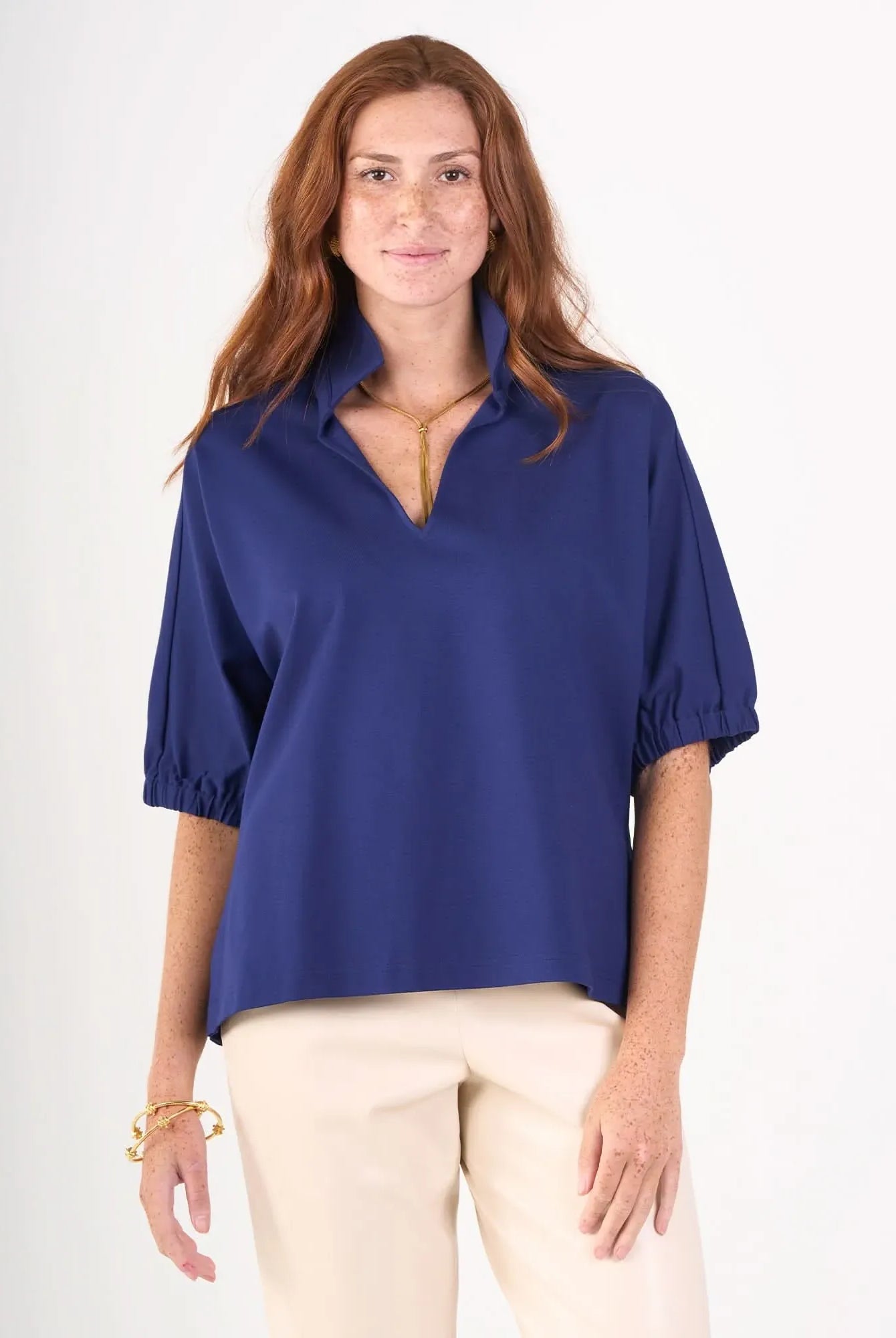 Navy cotton poplin Poppy Top by Emily McCarthy displayed from the front, showcasing its stylish design and fit.