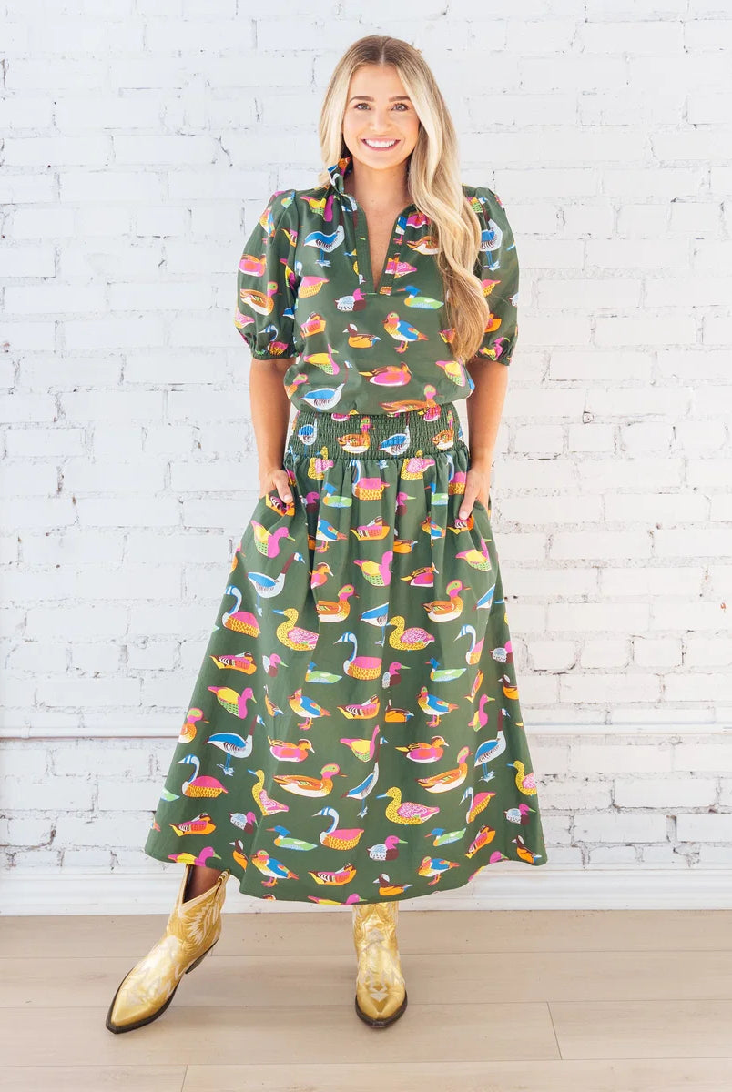 Caryn Lawn Sutton Skirt in olive duck print, gathered midi skirt, smocked waistband, front view with matching top