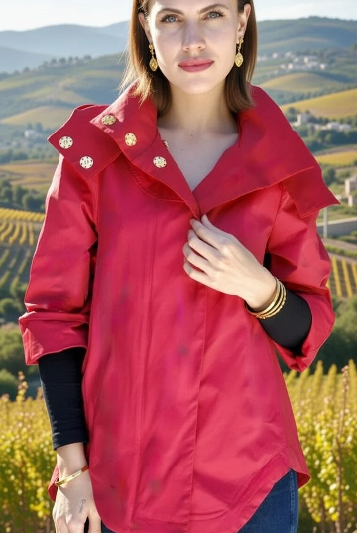 Nia Waterproof Jacket Barbados Cherry by Ciao Milano — zip-off hood open, gold hardware, adjustable sleeves, flowing silhouette"