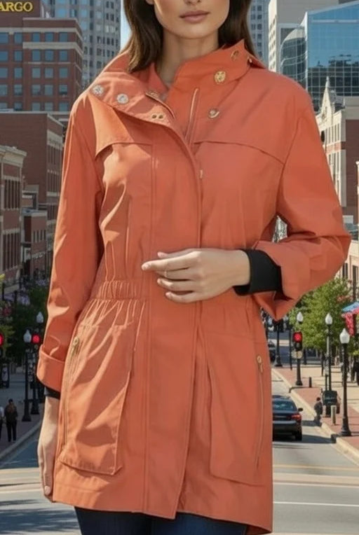 Tess Anorak Jacket in Orange by Ciao Milano — water-resistant lined anorak with gold snap buttons, cinched waist, and front patch pockets