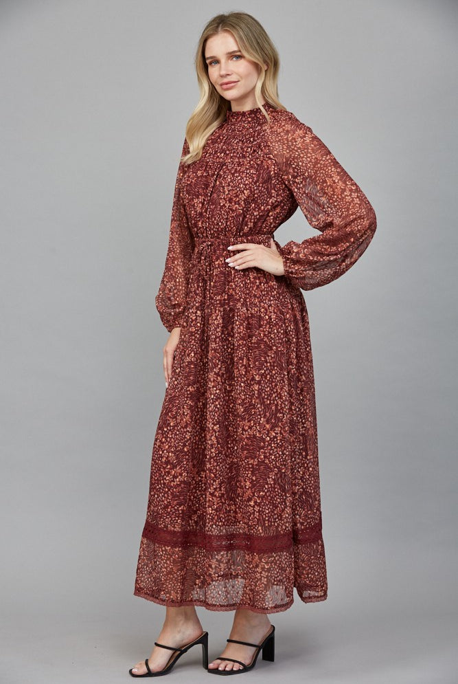 Rosemary Dress by Fate in deep burgundy floral Lurex print, side view, smocked waistband, billowy long sleeves style#FD34143