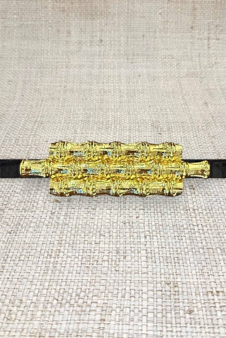 Triple bamboo belt buckle by Garland, featuring natural bamboo design and sturdy metal clasp on a neutral background.