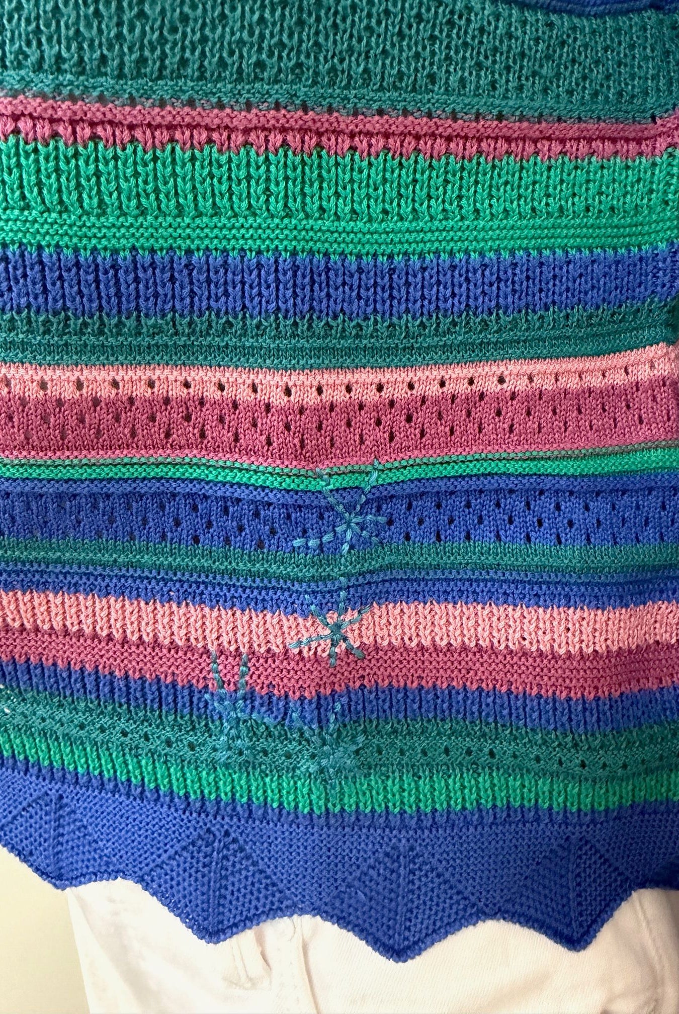 Alivia Abigail sweater in soft knit fabric, navy blue color, long sleeves, and classic crew neckline, displayed on a hanger.