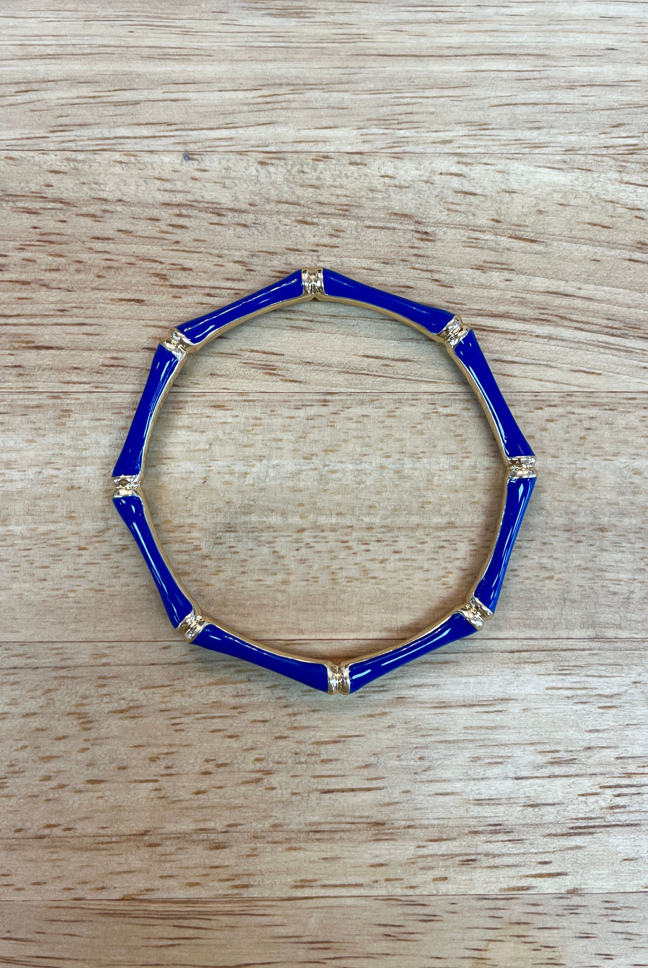 Sm Style bamboo jewelry bangle with natural bamboo finish, showcasing a smooth, rounded design perfect for stylish accessories.