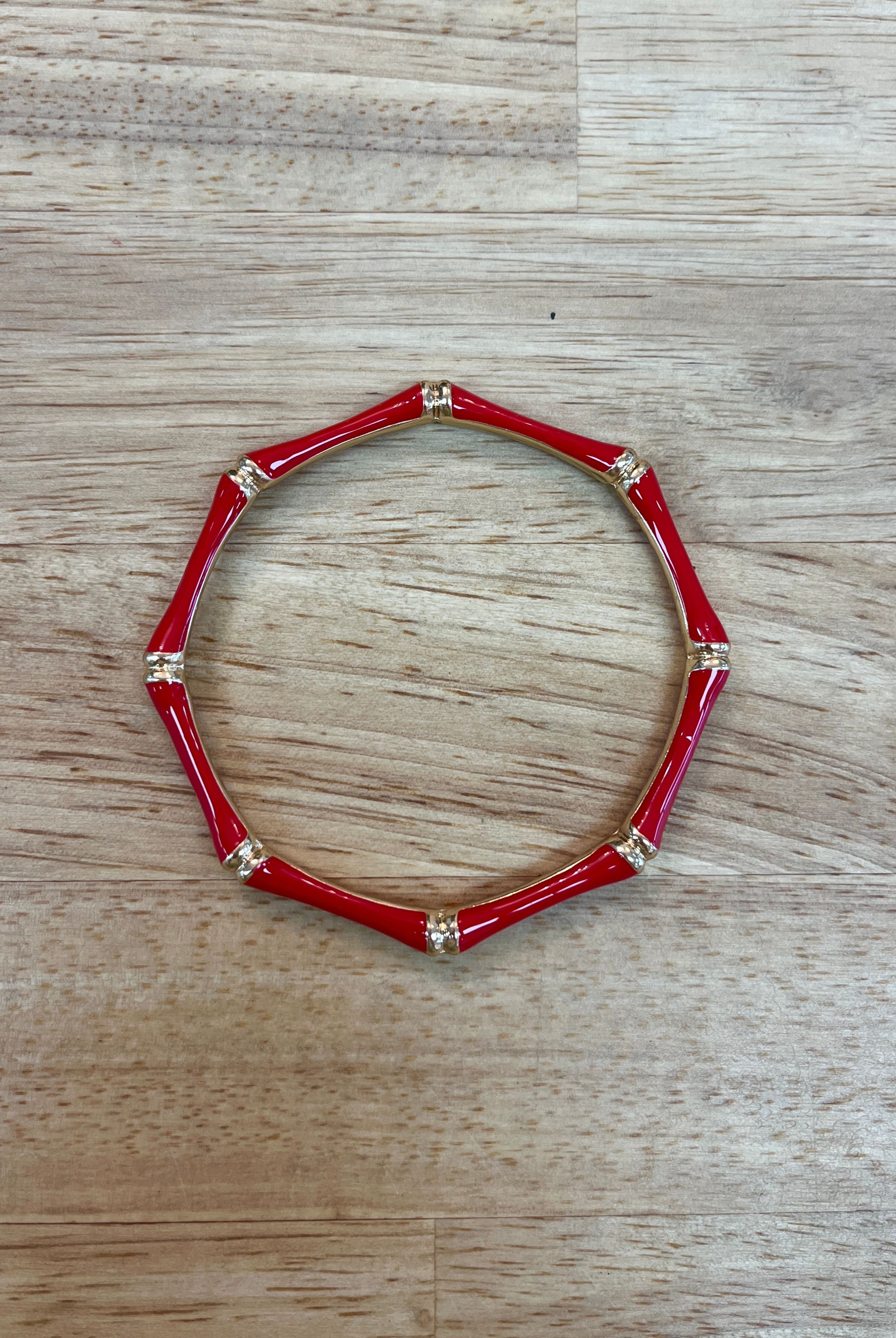 Sm Style bamboo jewelry bangle displayed on a neutral background, showcasing its natural bamboo texture and smooth finish.