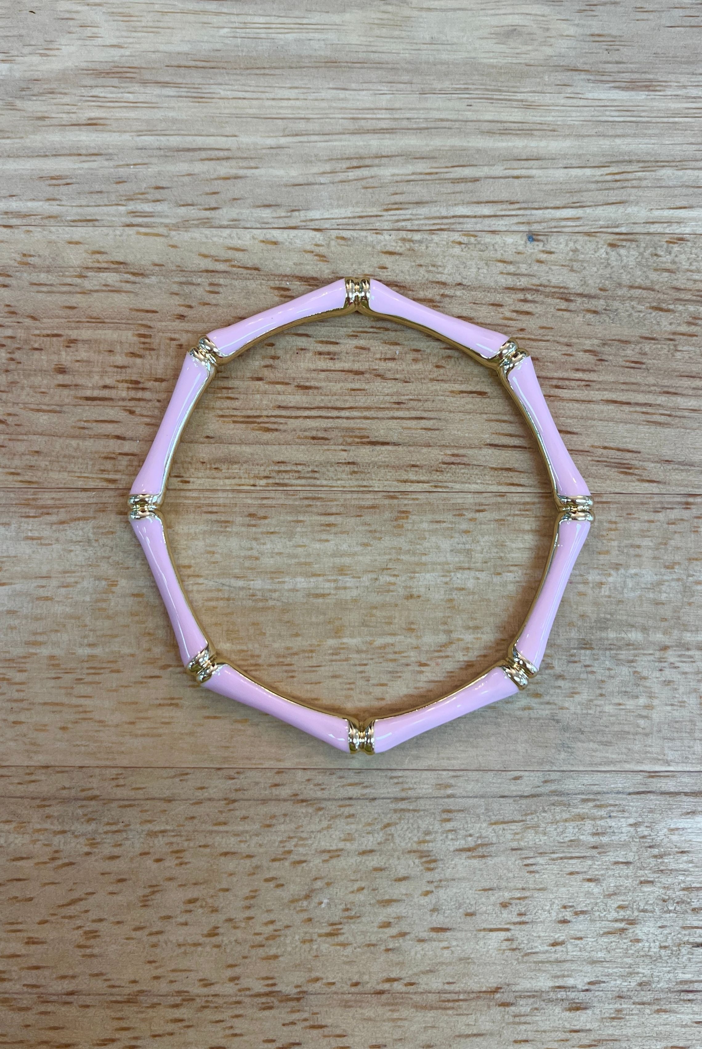 Sm Style bamboo jewelry bangle with smooth, natural finish and lightweight design, perfect for casual or stylish wear.