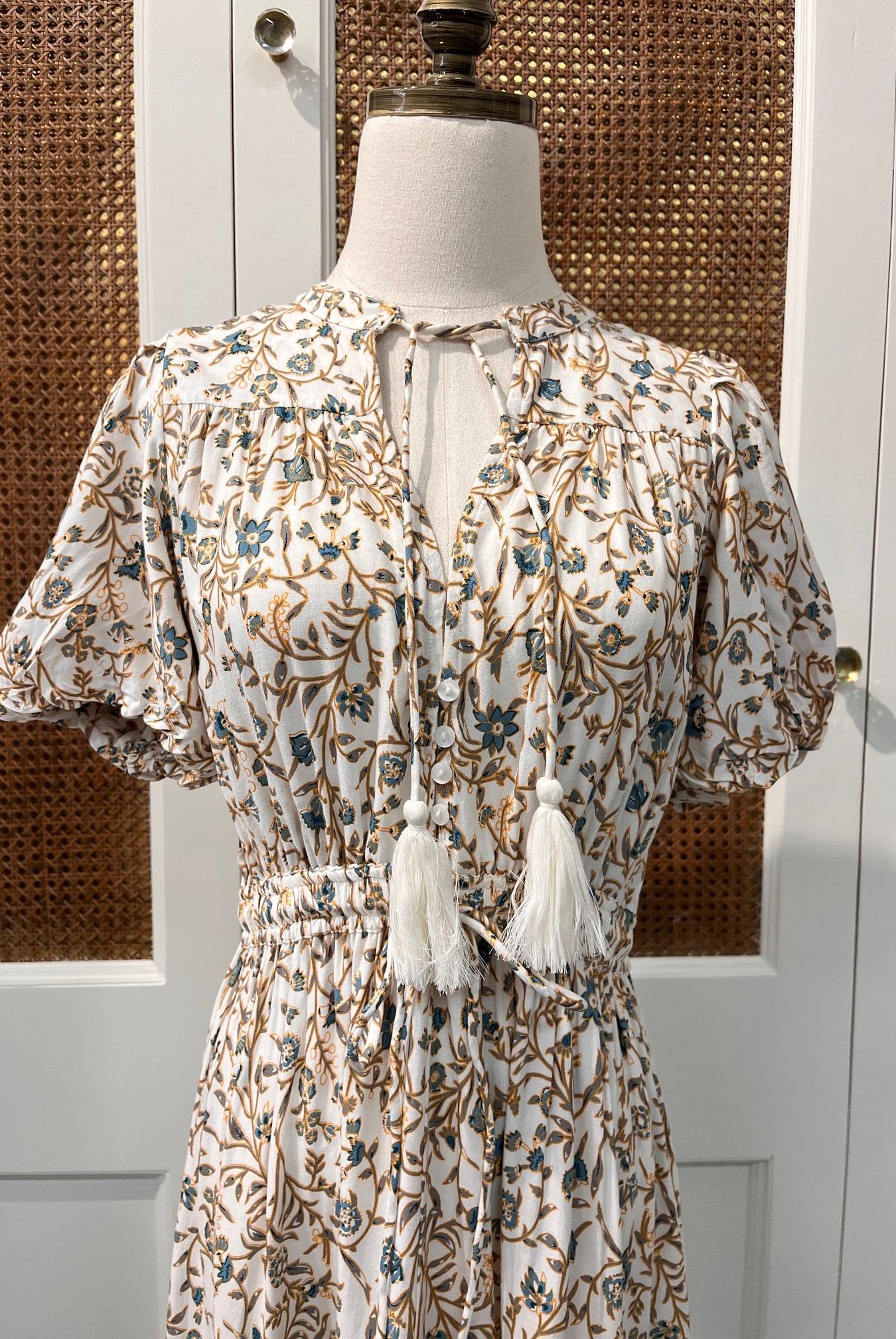 Elan Carina Dress shown in a stylish design, featuring flowing fabric and elegant details, perfect for casual or semi-formal wear.