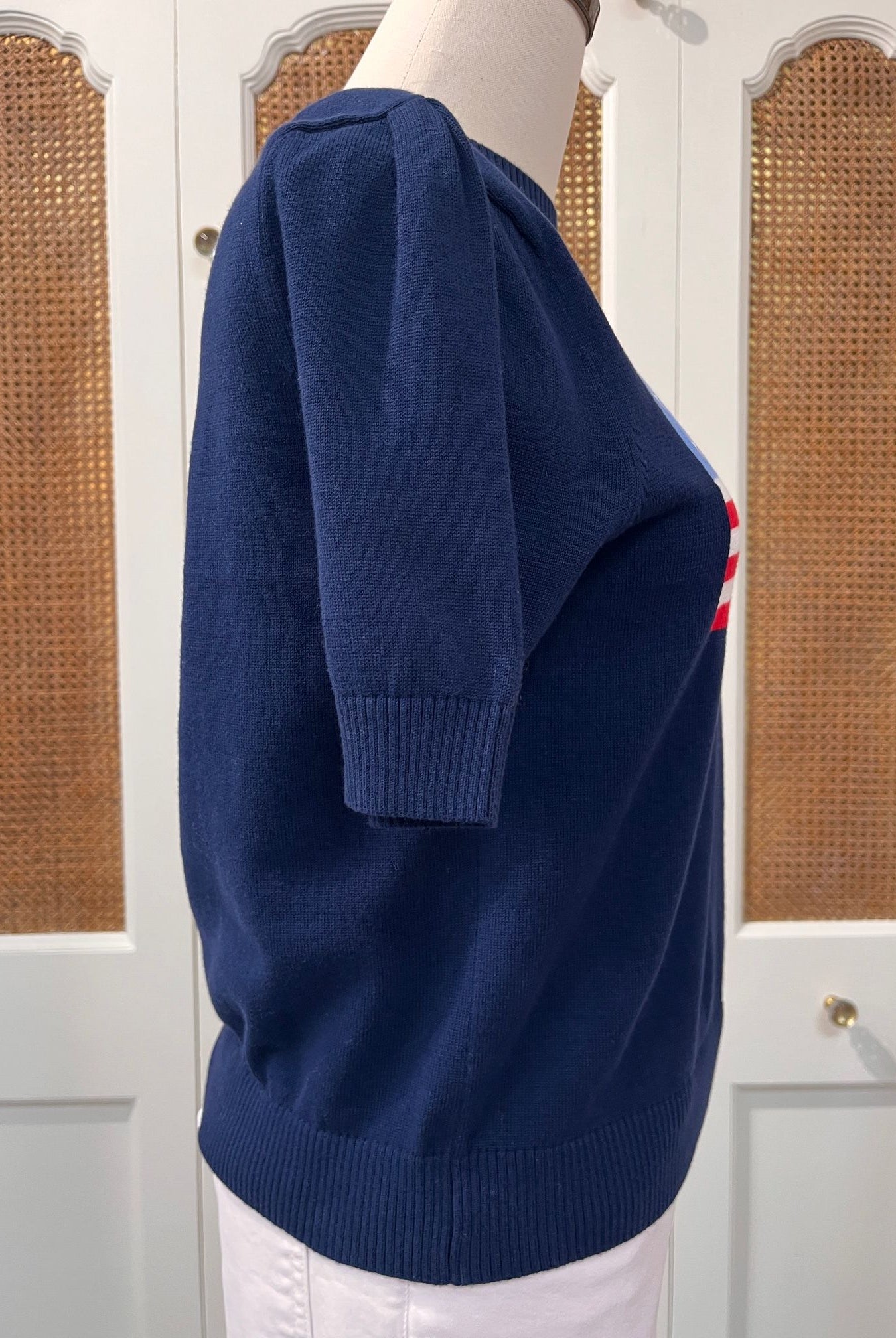 Navy puff sleeve flag sweater top by Duffield Lane, featuring a stylish patriotic flag design and soft knit fabric.