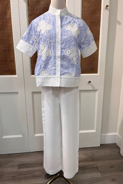 JADE Edna Top, stylish sleeveless blouse in soft fabric with a relaxed fit and subtle detailing, on a neutral background.