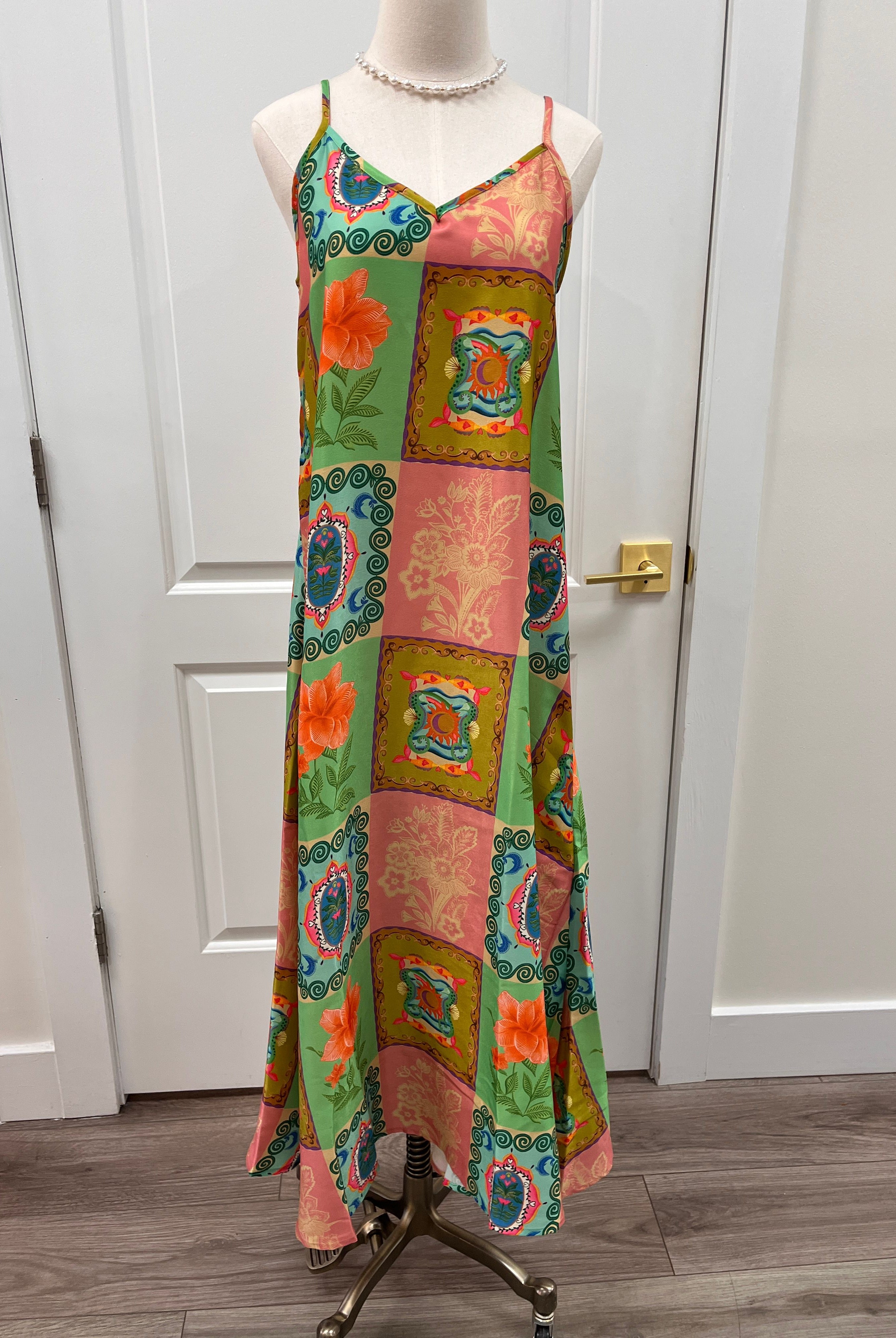 Briton Court Camille dress in soft fabric with a fitted bodice and flowing skirt, displayed on a mannequin.