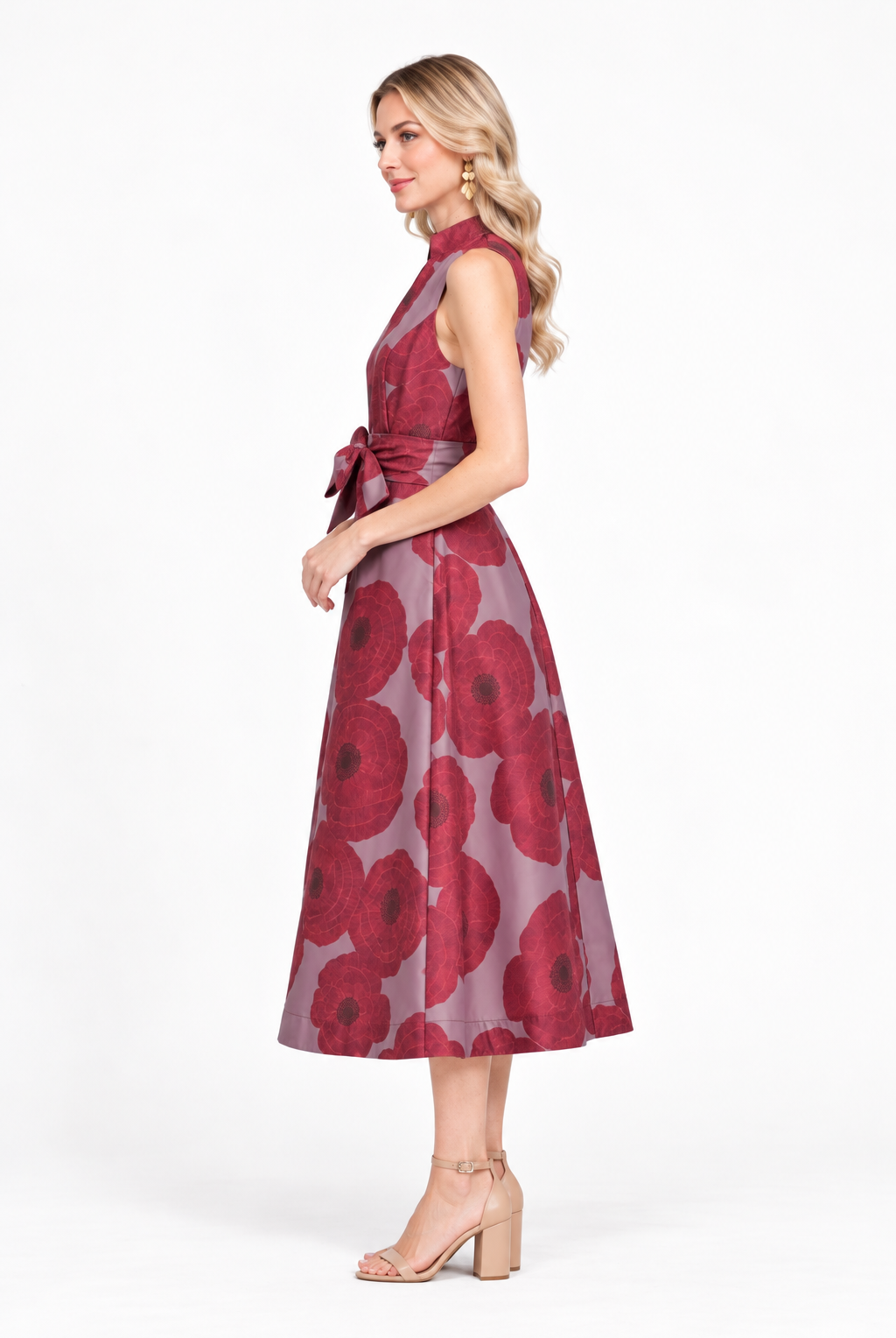 Clara Dress by Jade in crimson poppy, side view showing sleeveless bodice, waist sash, and midi skirt