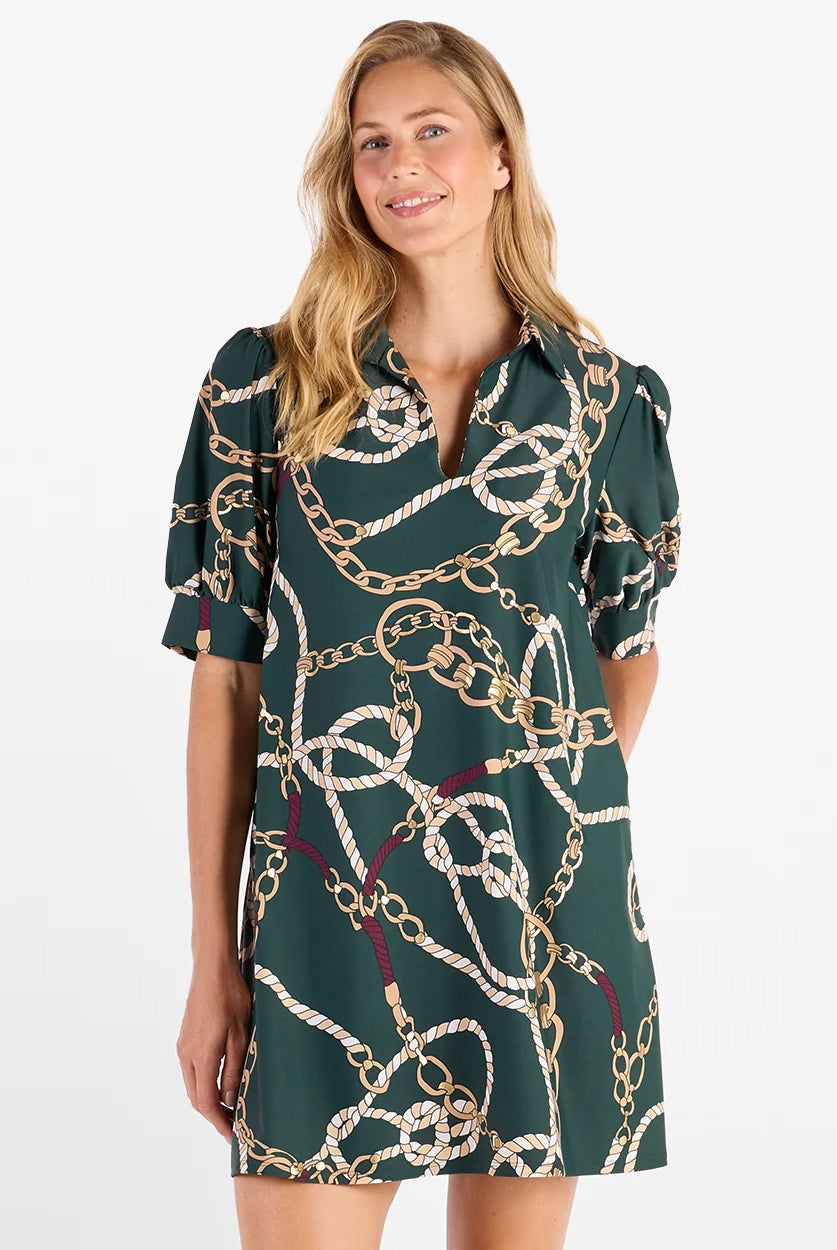 Emerson Dress Pine Gold by Jude Connally, style 101353, green chain print, V-neckline and puff sleeves, front close-up