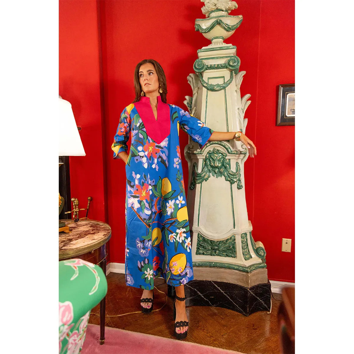 Blue Veranda Babs Dress by House of MBR, displayed on a hanger showing its flowing fabric and vibrant color.