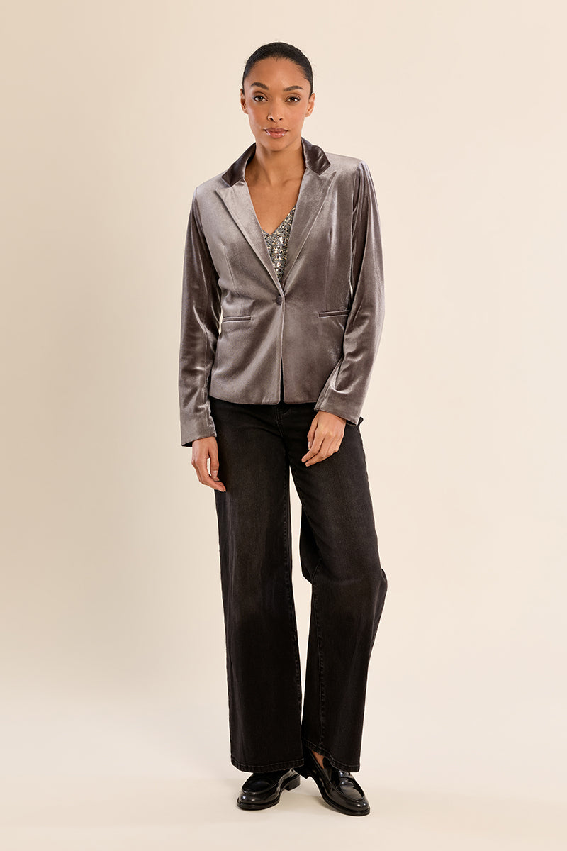 gray velvet blazer with notched lapels and a single front button