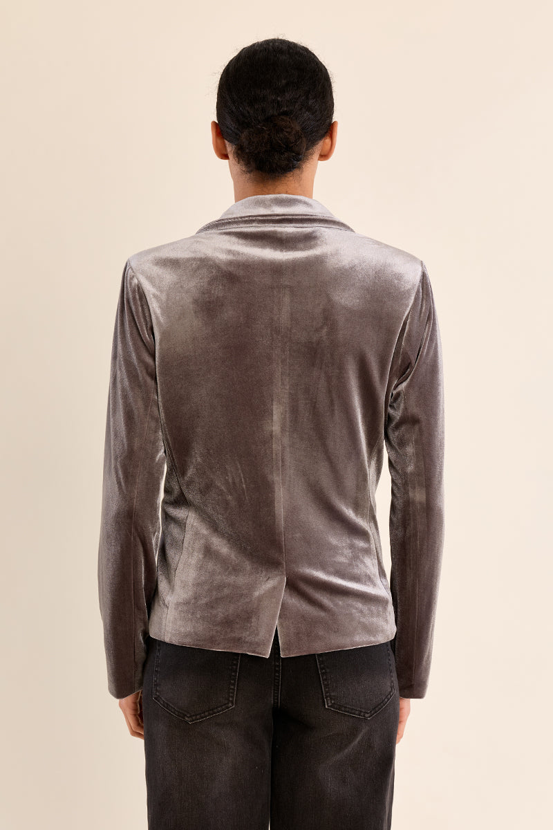 gray velvet blazer with notched lapels and a single front button