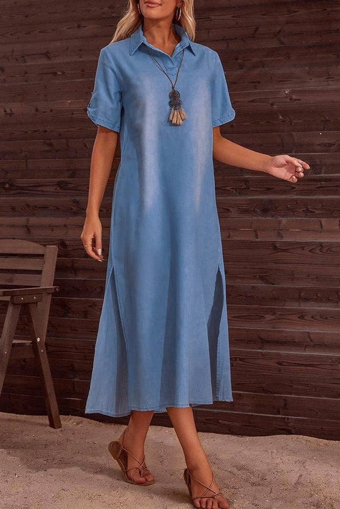Delphine Dress by Rosa Clothing — blue denim maxi dress, collared neckline, short sleeves, side slit,