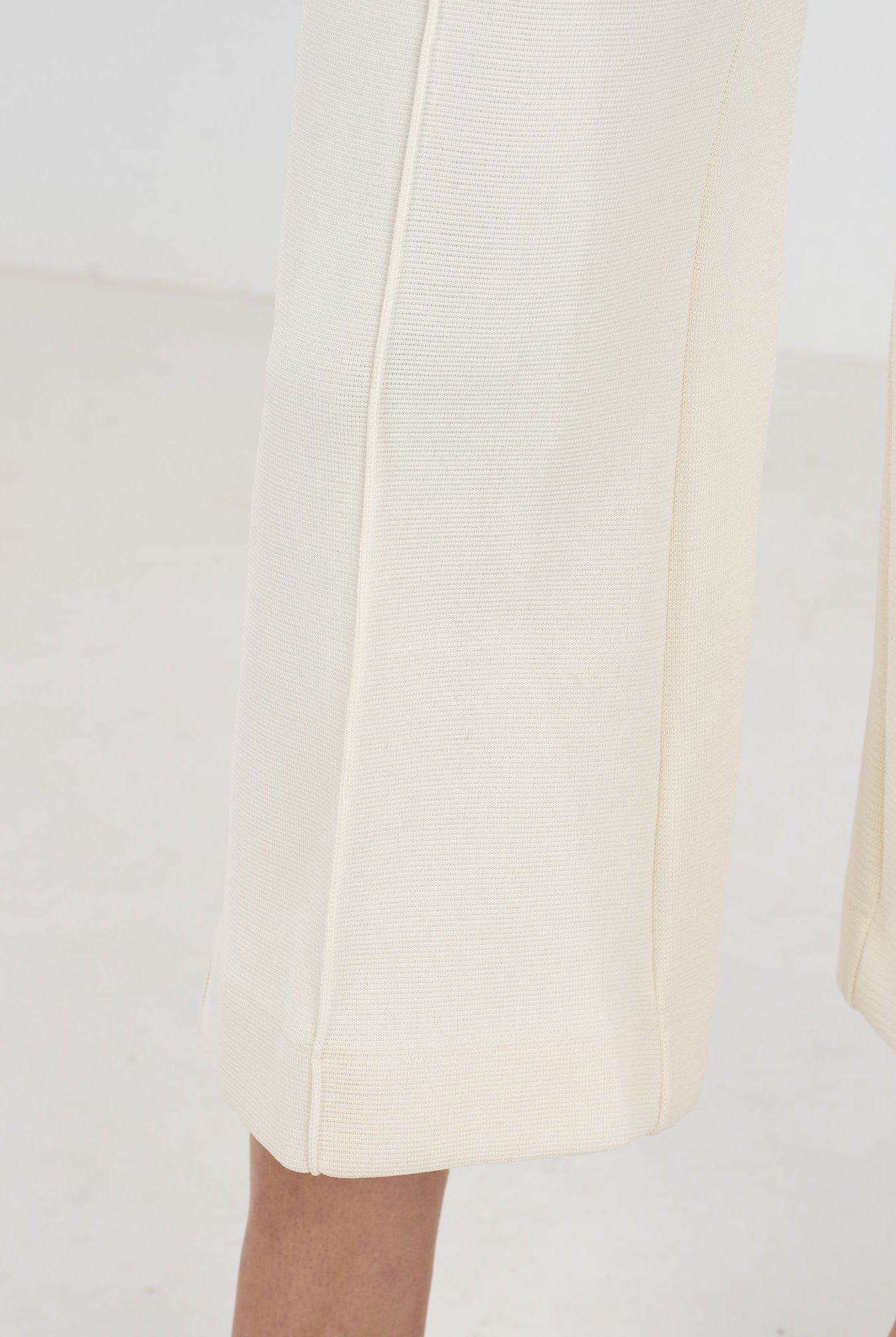 Close-up of Emily McCarthy Luna pants showing detailed embroidery on the stylish bottoms.