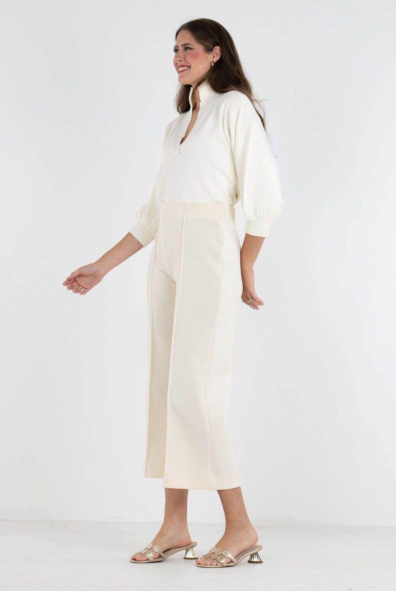 Emily McCarthy Luna Pants, cropped bottoms with side details, styled in a relaxed fit and neutral fabric for casual wear.