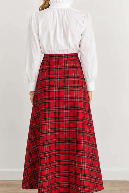Holly Skirt by Sail to Sable in red and green plaid with a wide waistband and flared ankle-length silhouette, back view