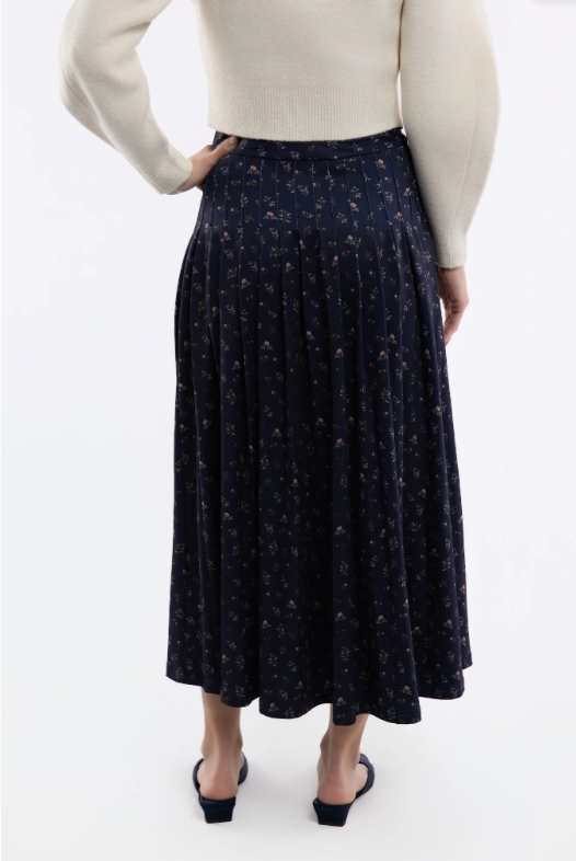 Lennox Skirt by Smith and Quinn in navy floral, back view showing pleated midi silhouette, style 15030