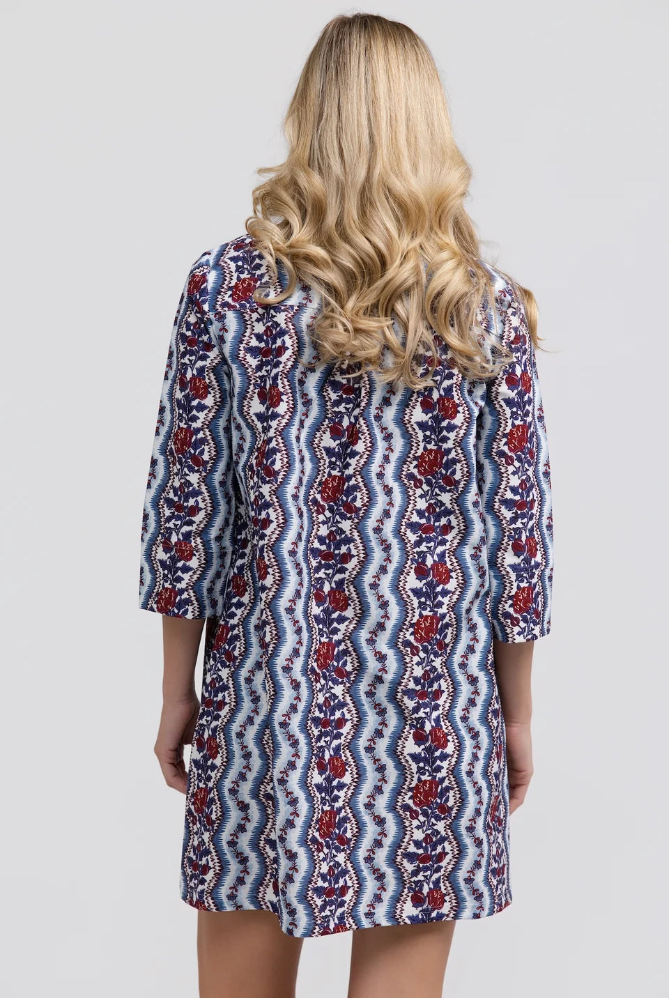 Martha Dress by Smith & Quinn with blue wavy stripes and burgundy florals, three-quarter sleeves and short hem, back view