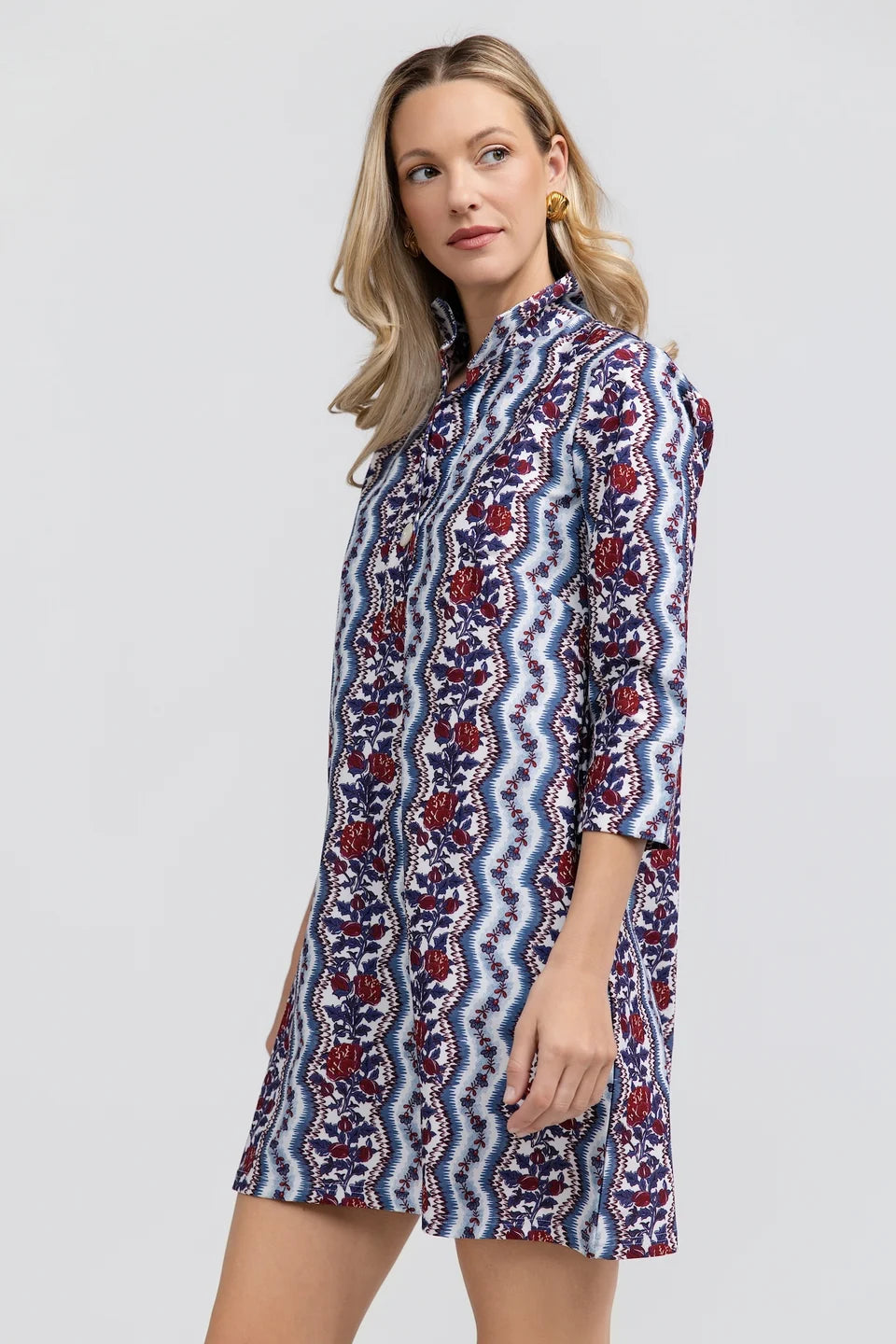 Martha Dress by Smith & Quinn in blue stripes and burgundy florals, showing collar and shift silhouette, angled view