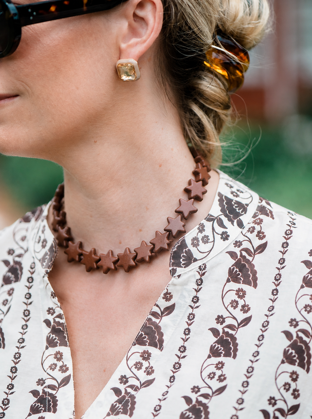 tar Necklace Large Brown by Smith and Co. Design — brown star bead necklace layered on model | Marj & Lizzie