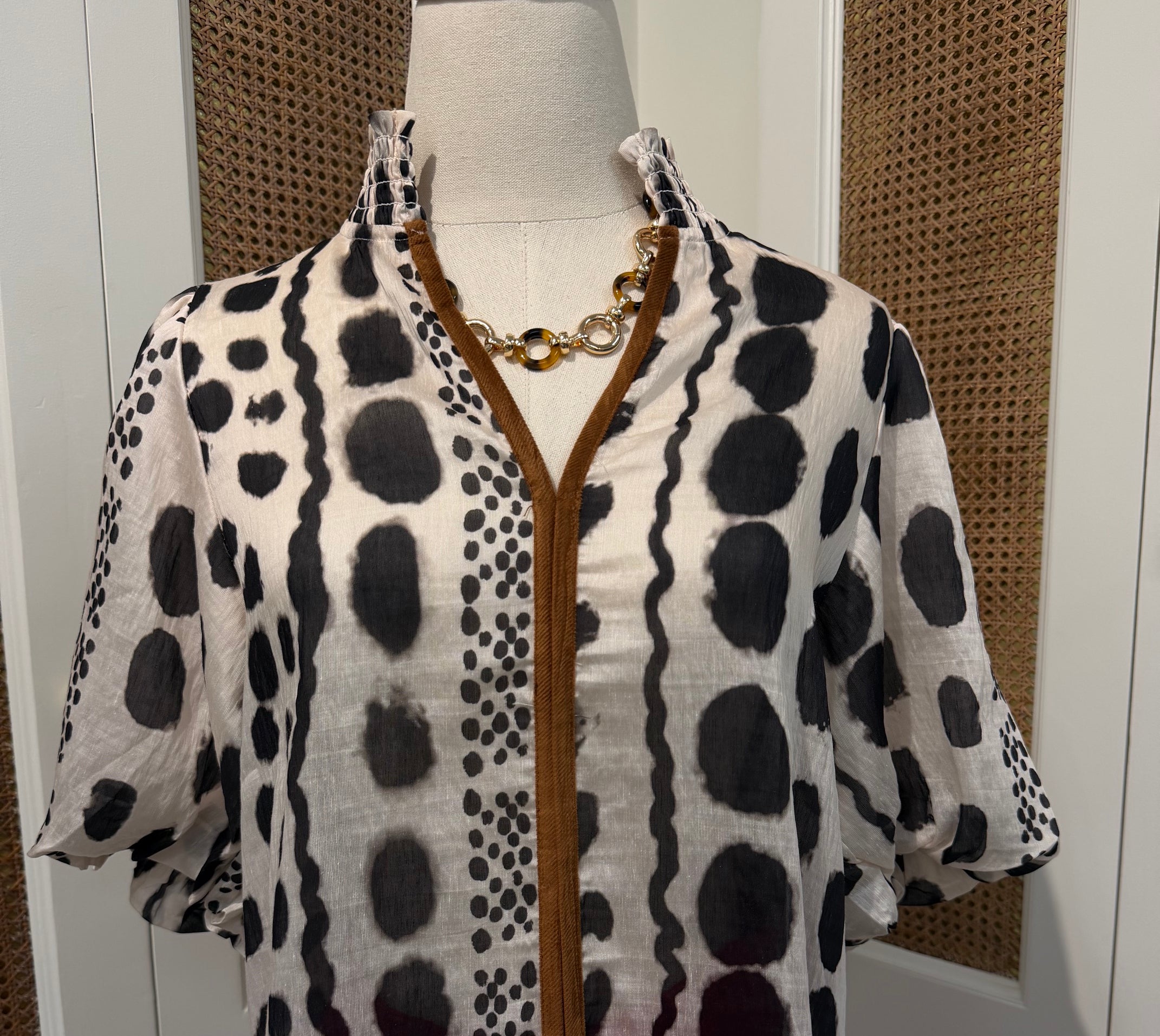 Julia Top by THML — black and white geometric print, smocked neckline, short puff sleeves, front view FTM3126-3