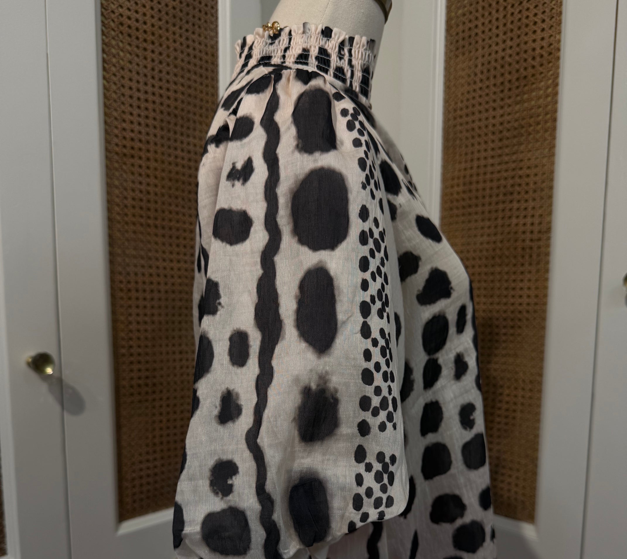 Julia Top by THML — black and white geometric print, smocked neckline, short puff sleeves, side view FTM3126-3