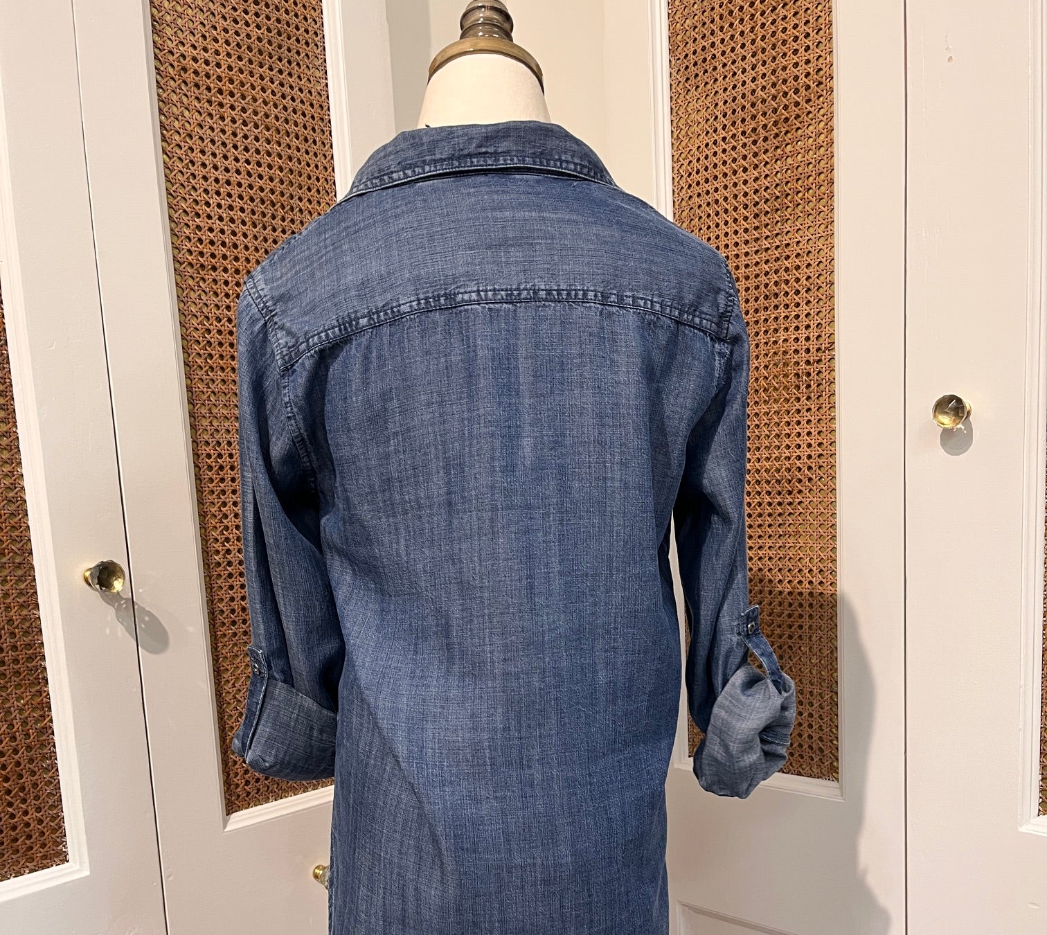 Talma Top by Velvet Heart — back view of medium wash denim button-front shirt with spread collar and rolled tab sleeves