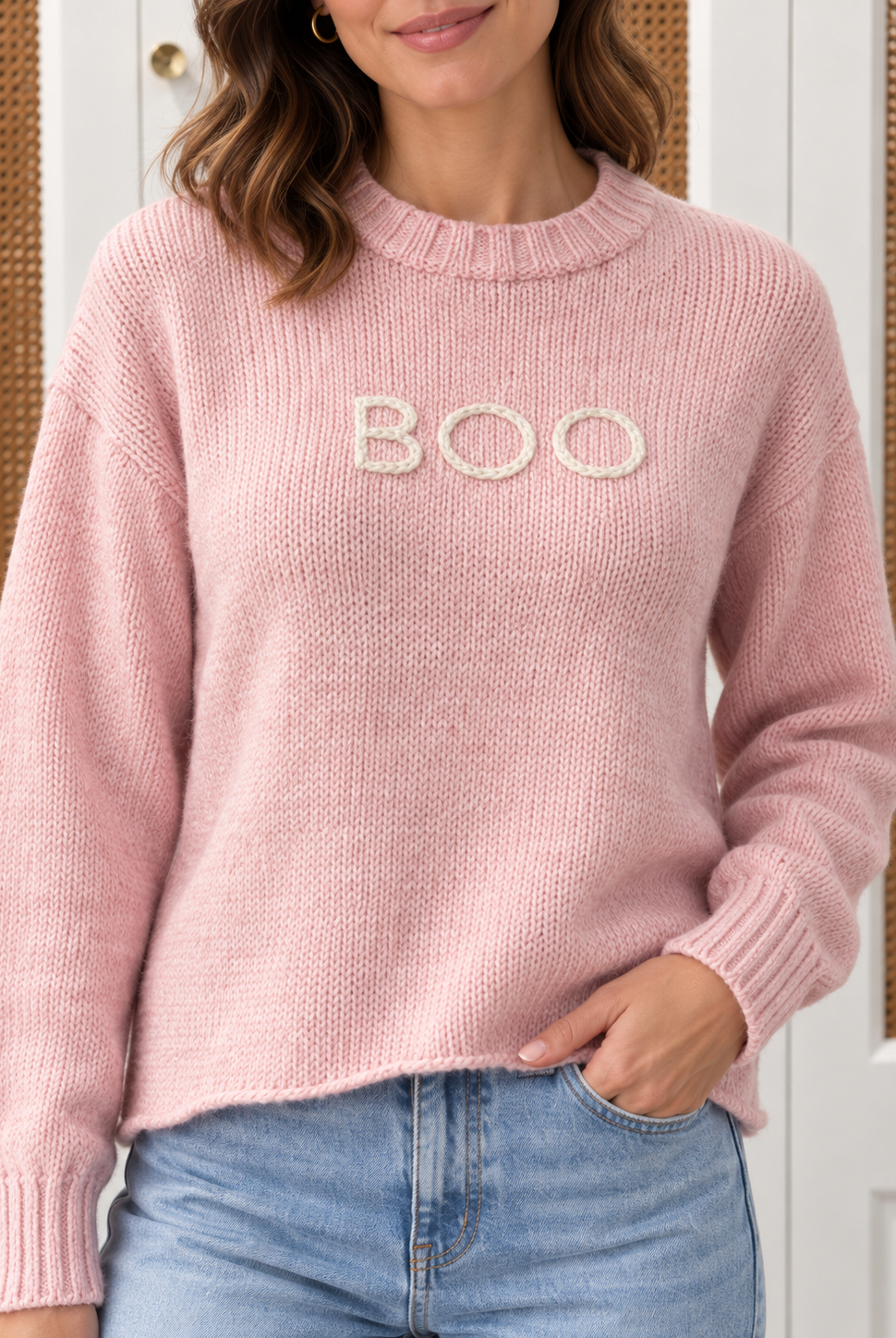 Wooden Ships Boo Sweater in arctic pink, style K57CPE3W693 — close-up of BOO embroidery on chest with ribbed crew neckline and cuffs