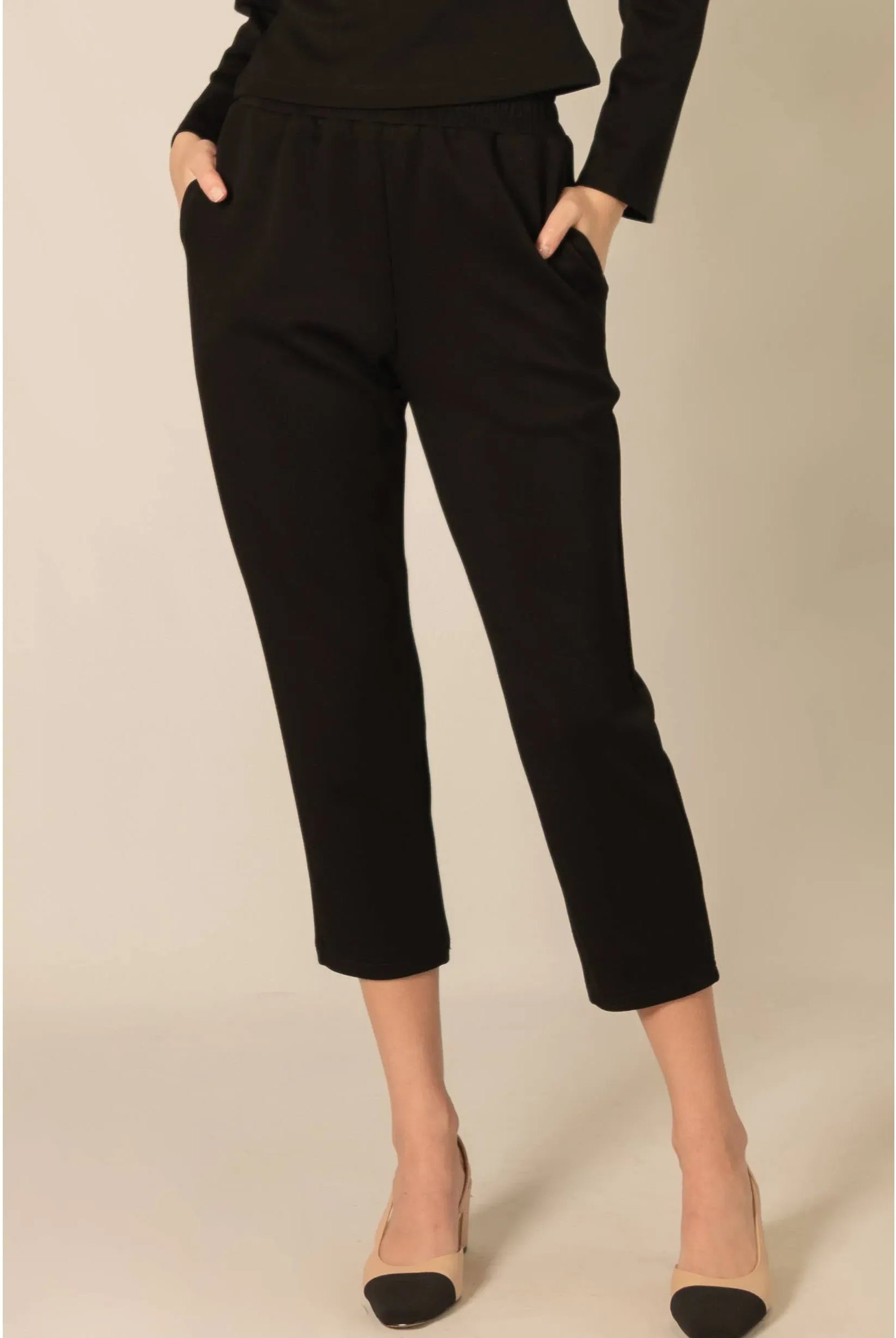 Black Patty Pants by P Cill featuring a comfortable butter modal fabric and ankle-length design.