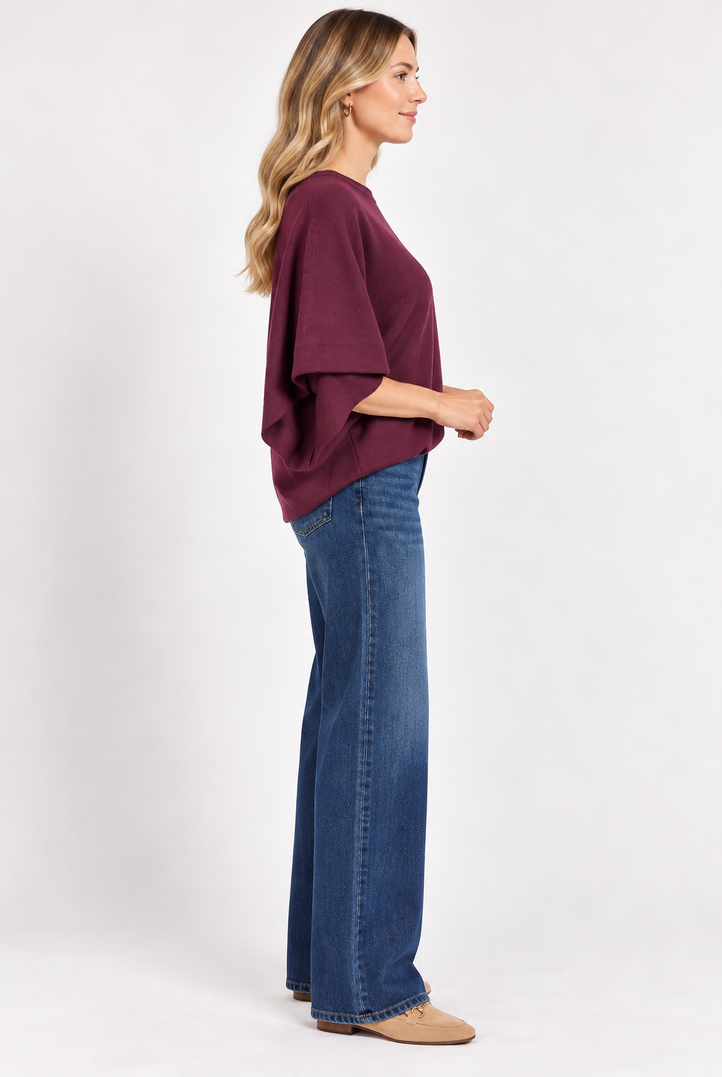 Eloise Top by Entro in merlot, side view showing round neckline, center seam, and wide draped sleeves. D31013