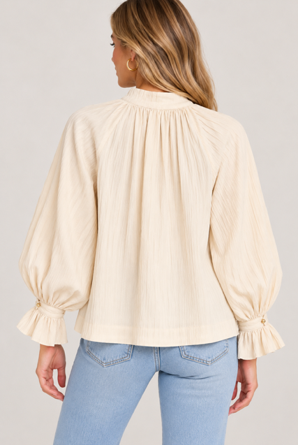 Louisa Top by Entro in ecru with tonal stripes, split V neckline, and flared cuffs, back view