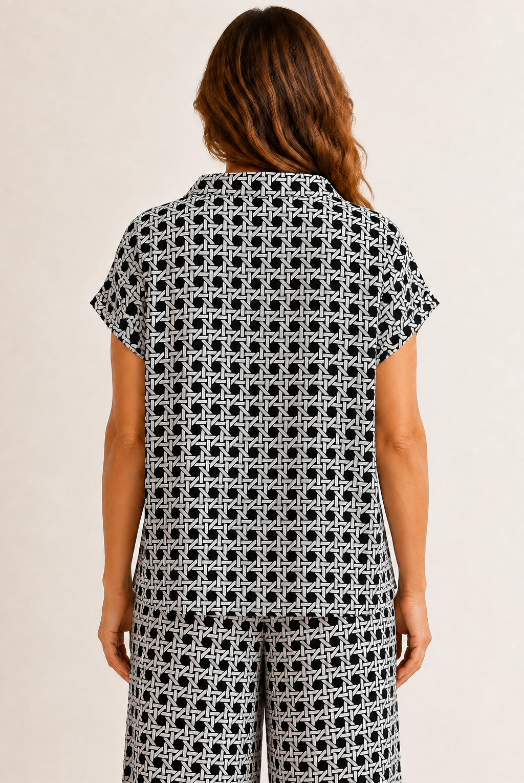 Back view: Tillie Top by Jude Connally in Black Rattan print, back view, mock neck, cap sleeves, relaxed fit Style # 301760