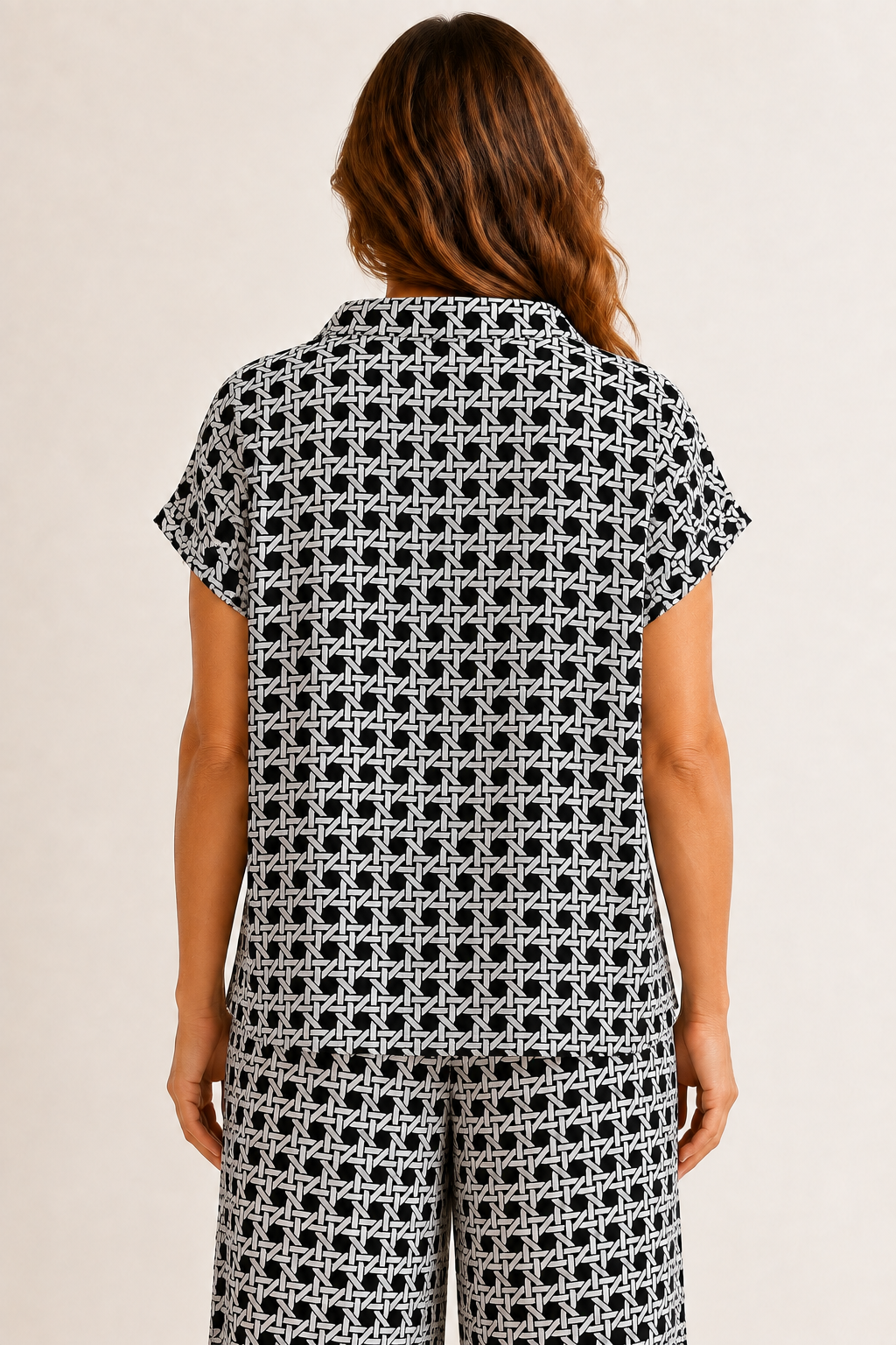 Back view: Tillie Top by Jude Connally in Black Rattan print, back view, mock neck, cap sleeves, relaxed fit Style # 301760