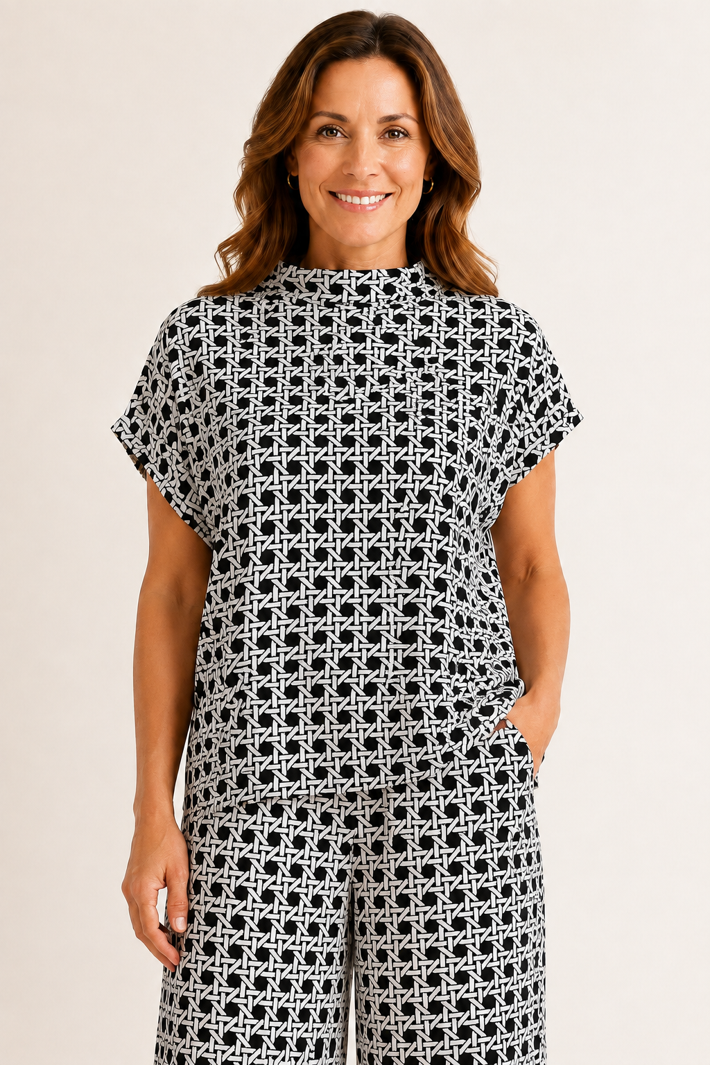Tillie Top by Jude Connally in Black Rattan print, front view, mock neck, cap sleeves, relaxed boxy silhouette Style #301760