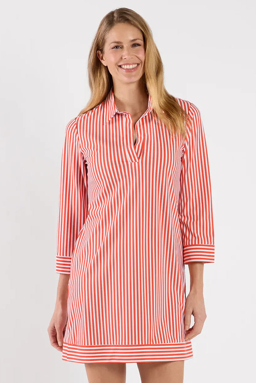 Jude Connelly Finley Dress in soft fabric with a flowing silhouette and subtle pattern, displayed on a hanger.