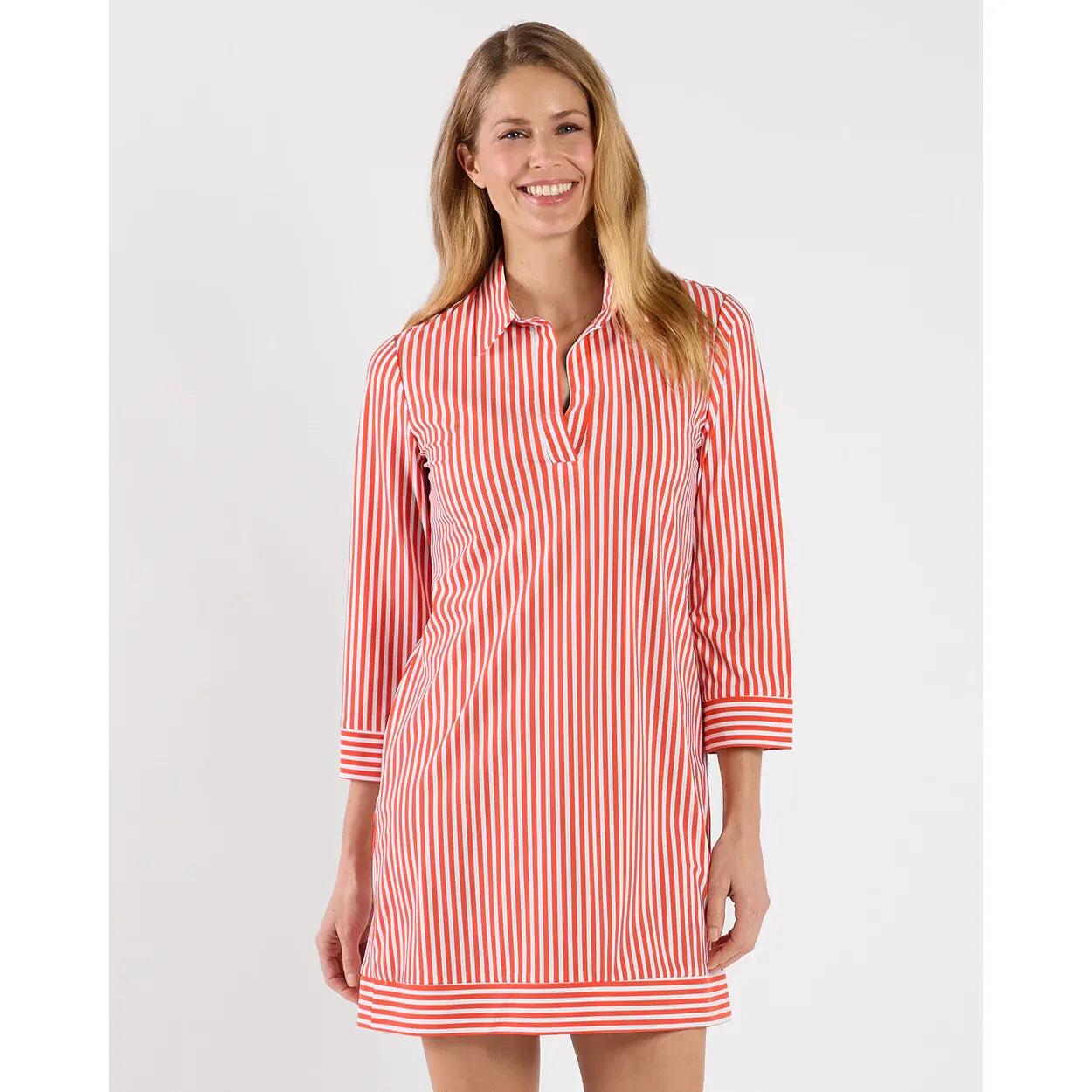 Jude Connelly Finley Dress in soft fabric with a flowing silhouette and subtle pattern, displayed on a hanger.